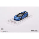 a blue car on a white surface
