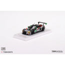 a toy car on a white surface