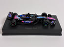 a toy race car on a black stand