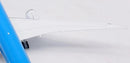 a white airplane with a wing