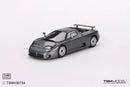 a grey toy car on a white background