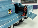 a toy car with a person sitting in the back of it