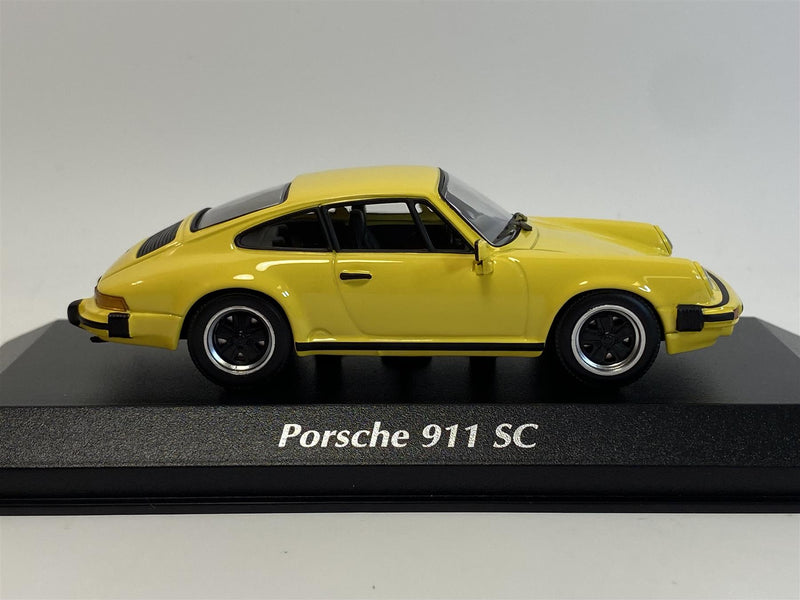 porsche 911 sc 1979 yellow 1:43 scale maxichamps 940062025