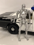 the terminator dodge monaco police with t-800  greenlight 19042 1:18 scale